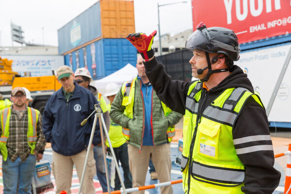 OSHA inspection man in yellow vest