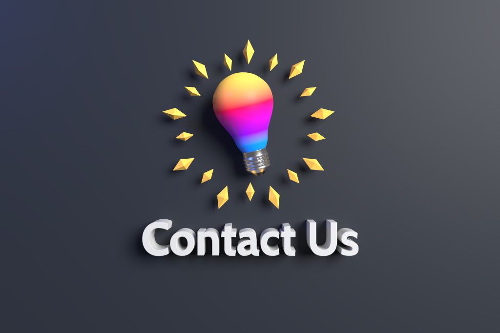 Colorful lightbulb surrounded by sparks saying Contact Us