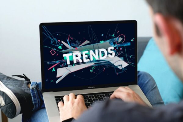 Laptop that says trends on a roofing website