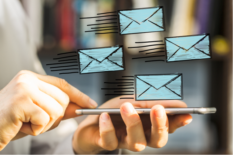 Person using email marketing on the go